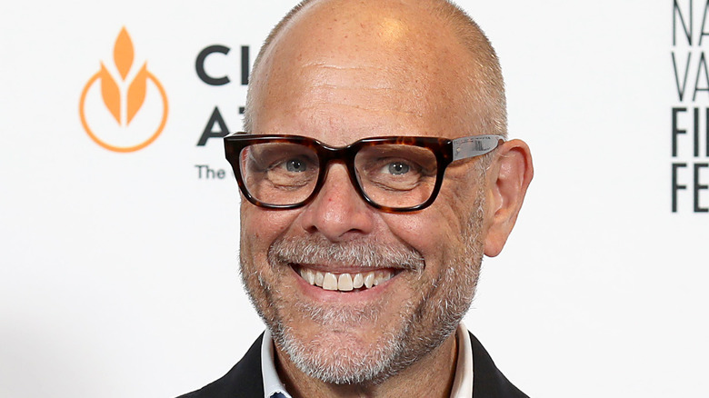 Alton Brown smiling at event