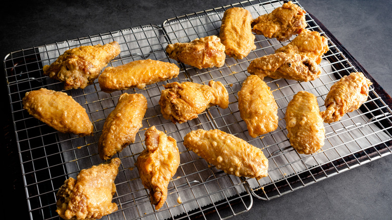 Crispy chicken on cooling rack