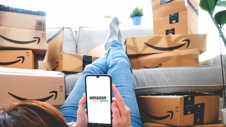 women shopping on Amazon Prime with delivered boxes