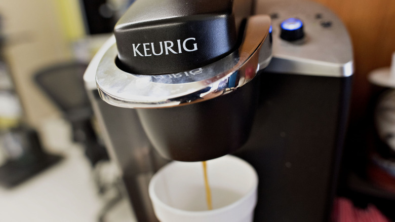 Keurig machine making coffee