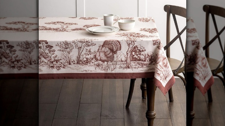 Red Thanksgiving tablecloth with dinnerware