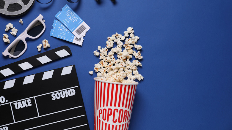 Movie popcorn against blue background
