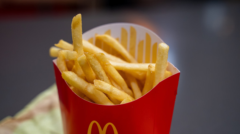 Closeup of McDonald's french fries in a medium red box