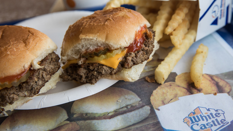 Two White Castle burgers on a tray with fries