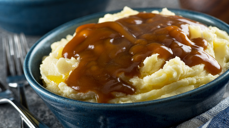 Mashed potatoes gravy blue bowl