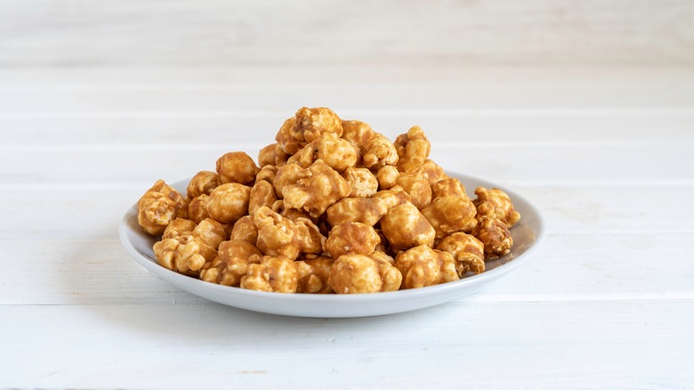 Peanut butter popcorn on a white plate