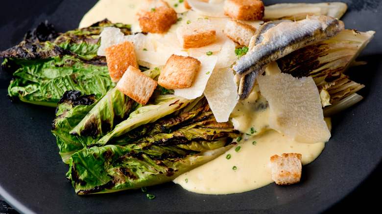 Grilled romaine Caesar salad croutons anchovies