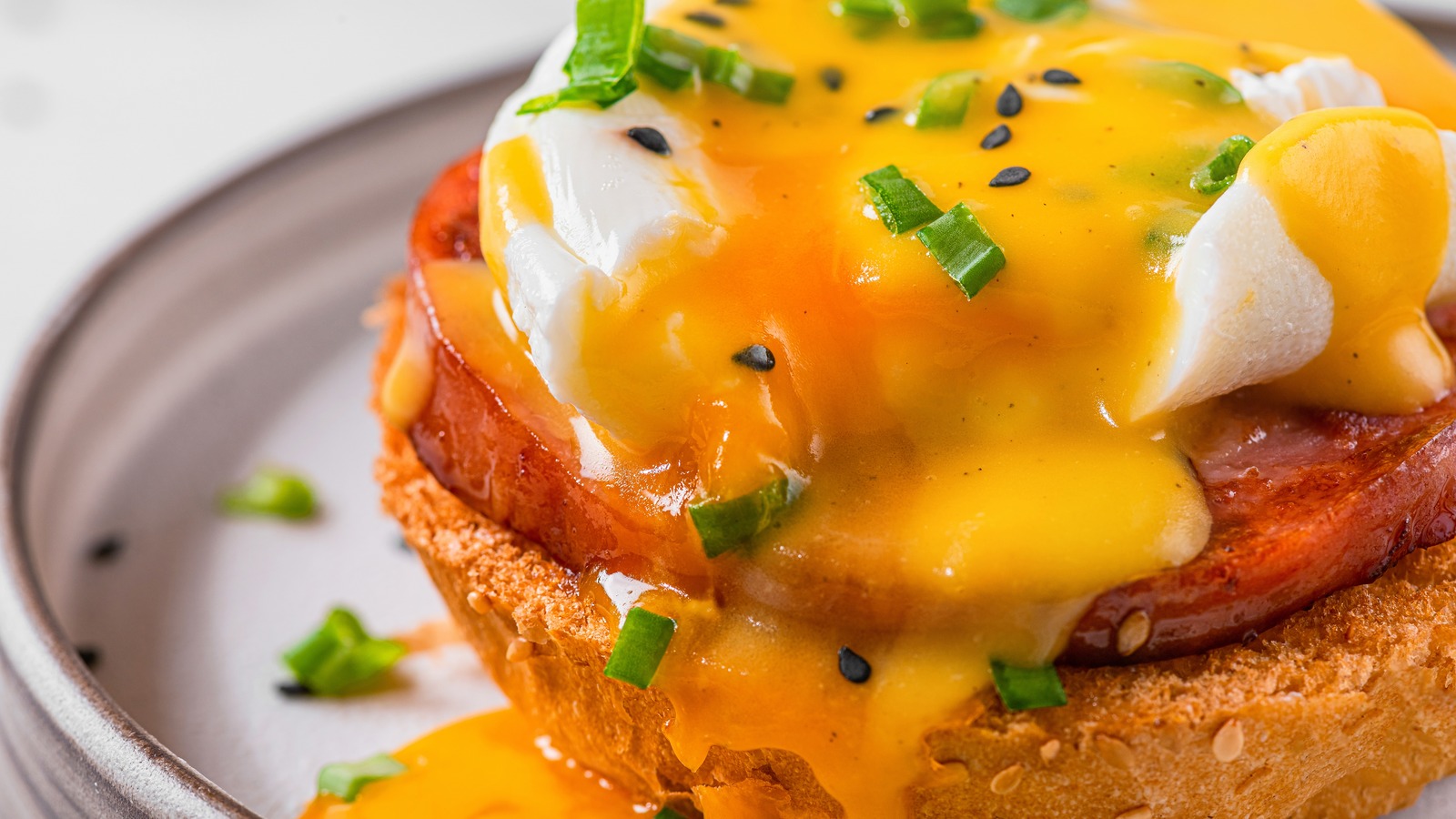 Andrew Zimmern's Unique Take On Eggs Benedict Features Pastrami