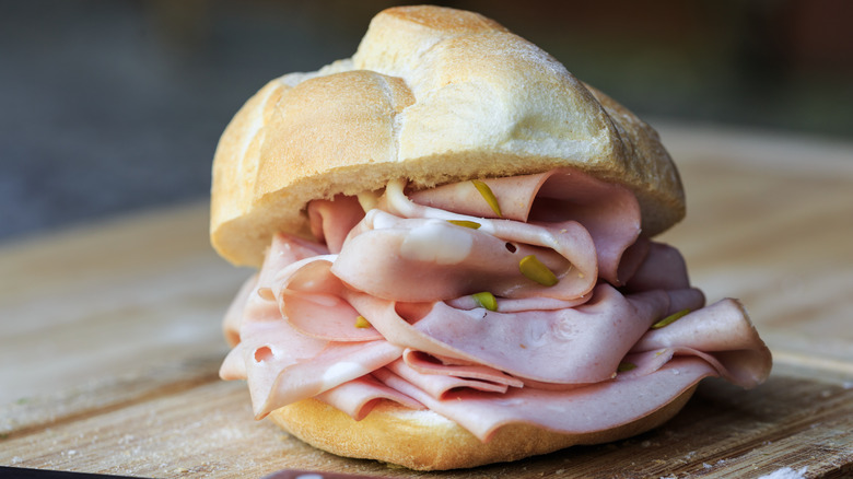 Mortadella sandwich on cutting board