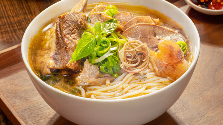 Bún bò Huế soup in a bowl