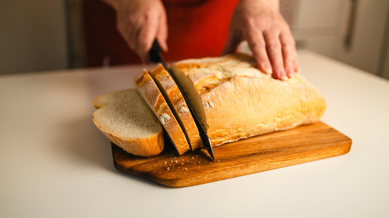 Bread being cut