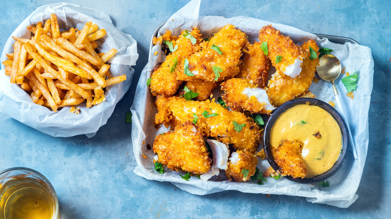 Different types of appetizers arranged together on a blue surface