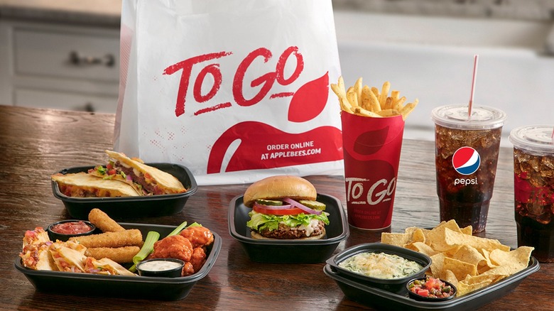 Applebee's To Go bag with food and drinks