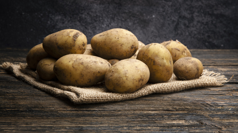 potatoes on a burlap sack