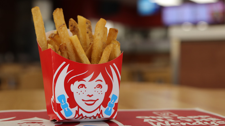 Wendy's fries on tray inside restaurant