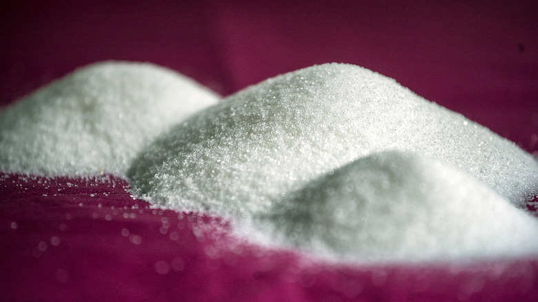 piles of refined white sugar