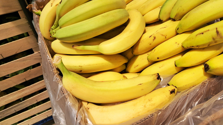 bananas piled up in box