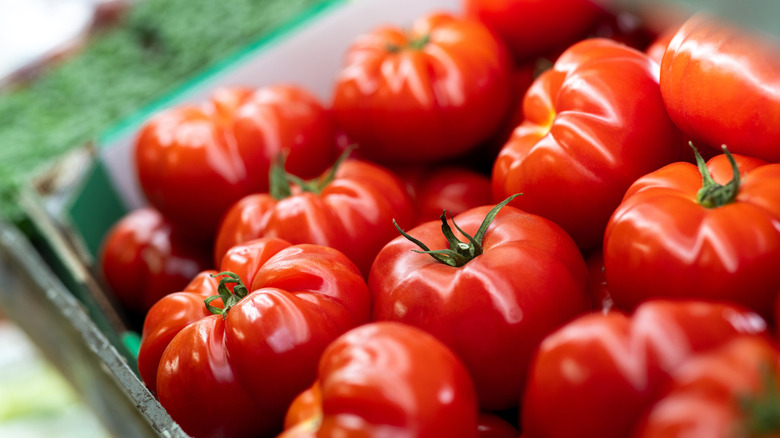 Crate of beefsteak tomatoes