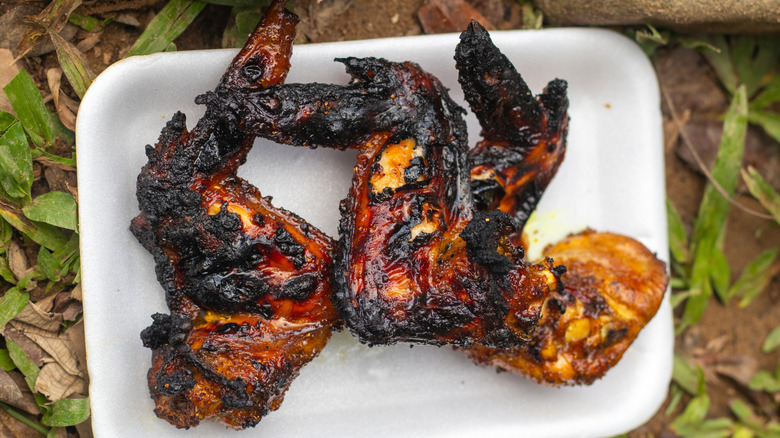 Grilled chicken wings on platter