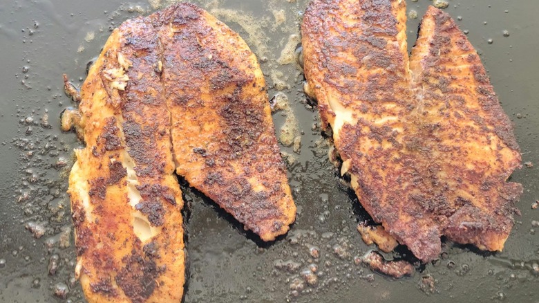Blackened fish on griddle