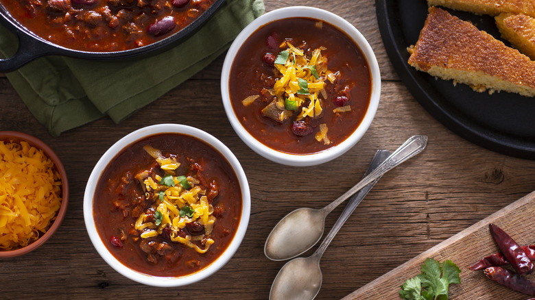 Bowls of chili with toppings