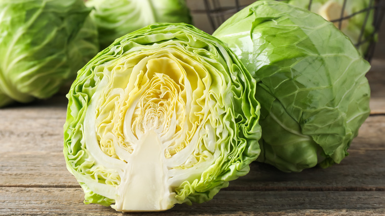Halved raw cabbage.