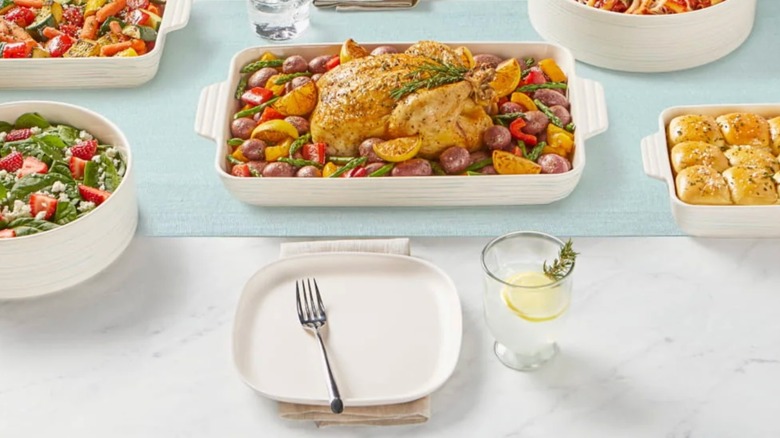 A collection of Pyrex ceramic cookware and dishes