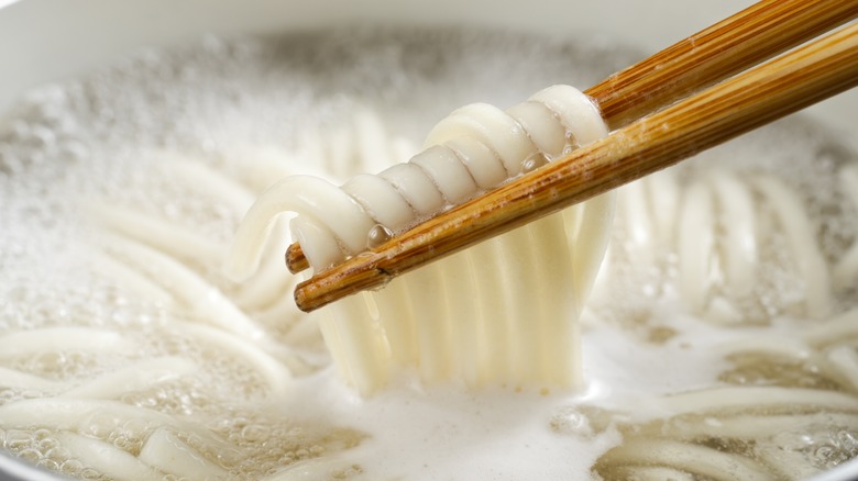 noodles boiling in hot water