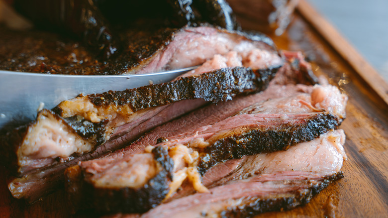 Slices of brisket on a board