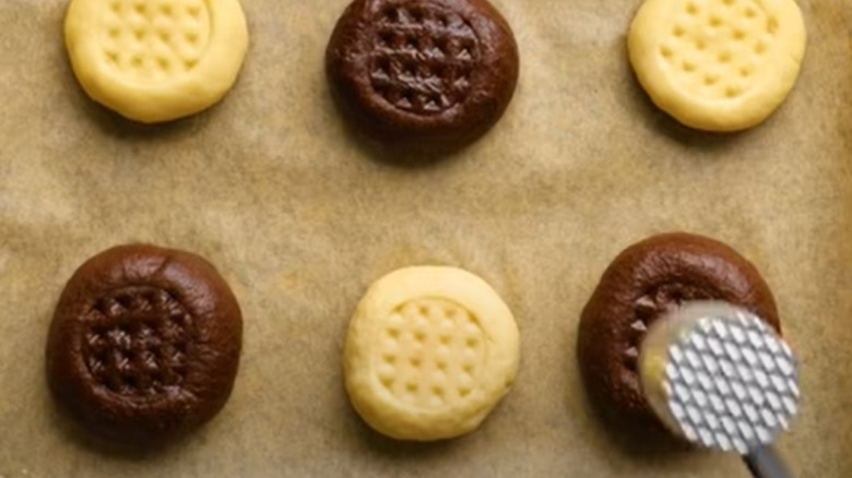 Cookie dough and meat mallet