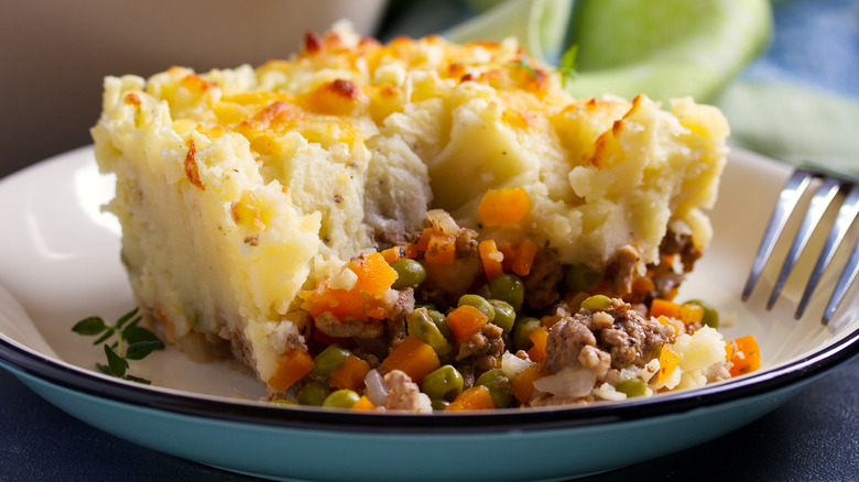 shepherd's pie filling spilling out from slice