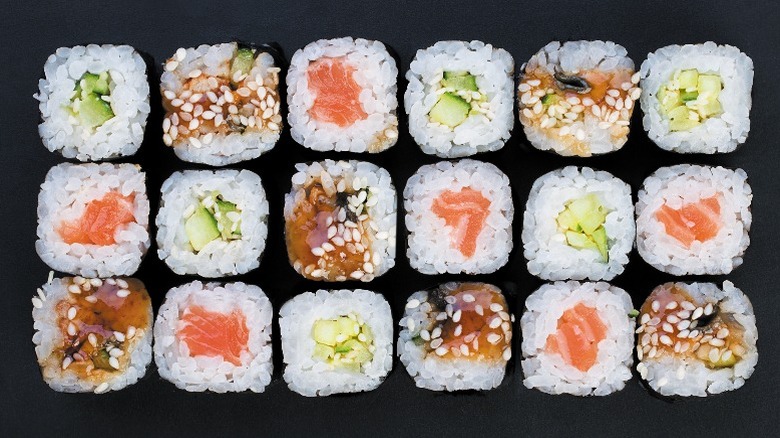 Maki sushi rolls in rows