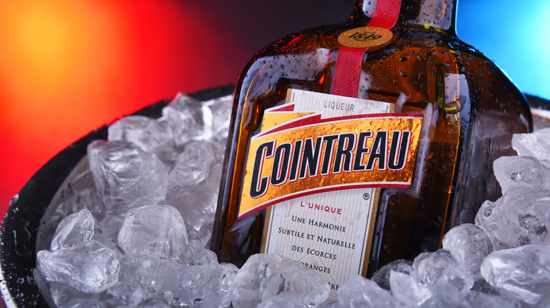 A bottle of Cointreau on ice