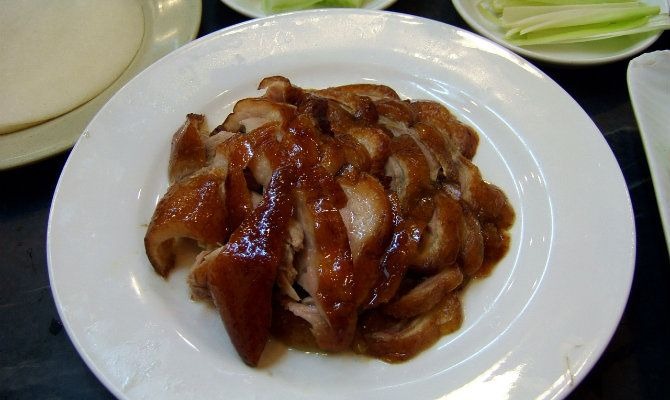 Beijing peking duck on a white plate