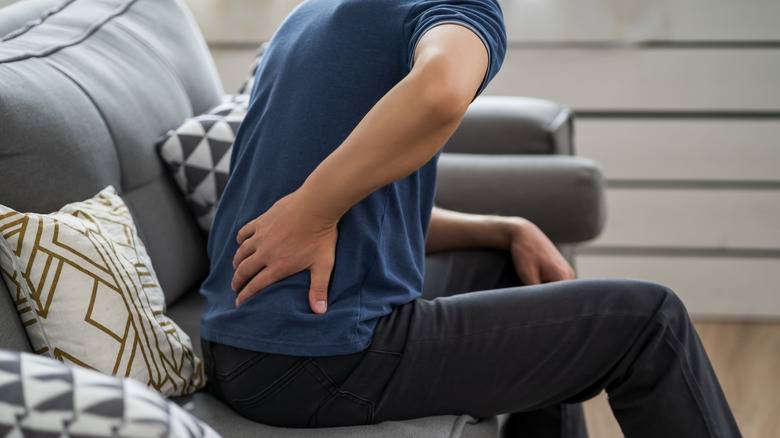 Man suffering from back pain