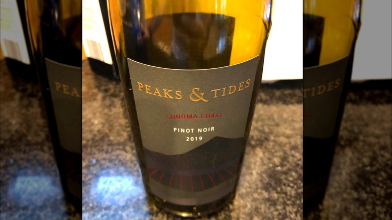 The label on a bottle of pinot noir on a kitchen counter