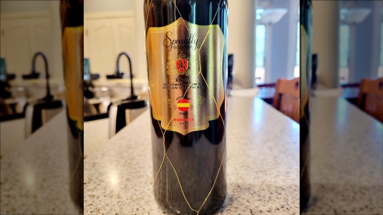 Photograph of the label on a Rioja bottle, on a kitchen counter