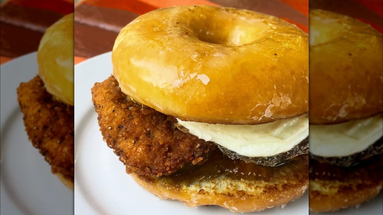 Fried chicken and egg on a glazed donut sandwich