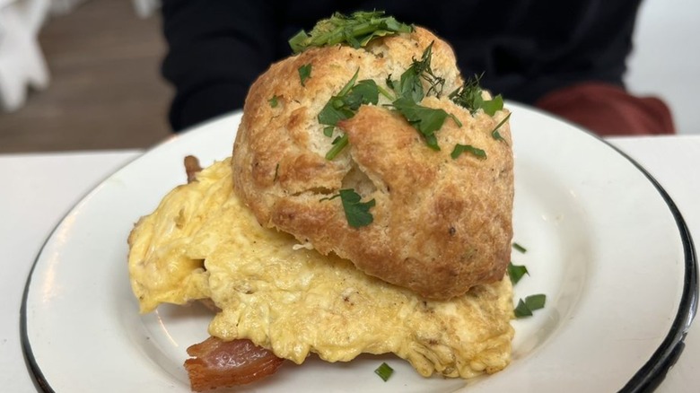 Biscuit sandwich with bacon and eggs