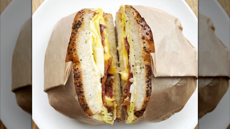 Poppyseed roll sandwich with bacon, egg, and cheese