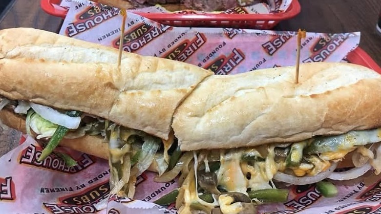 Steak & Cheese from Firehouse Subs in a red basket lined with paper