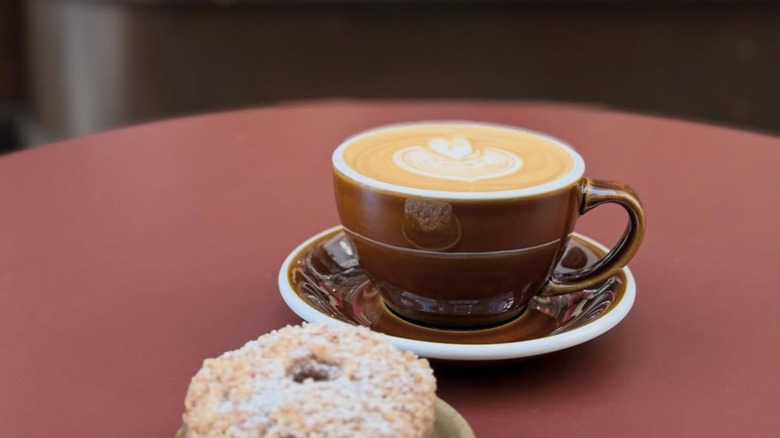 Donut and a cup of latte from Mandarin Coffee Stand