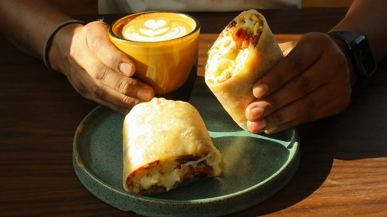 Latte and breakfast burrito from Picaresca