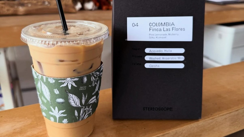 Iced latte and a bag of coffee bean at Stereoscope