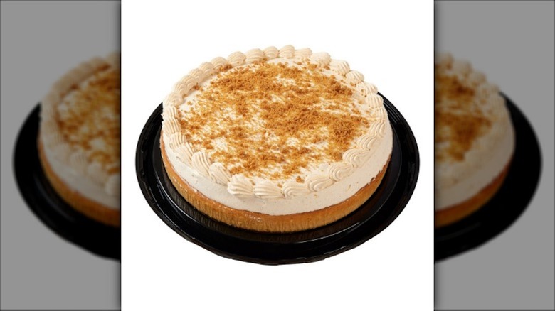Pumpkin cheesecake on white background