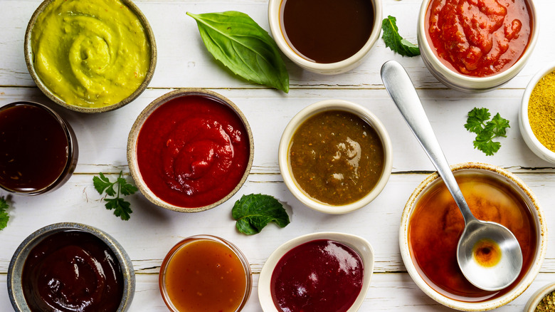 variety of dips on white table