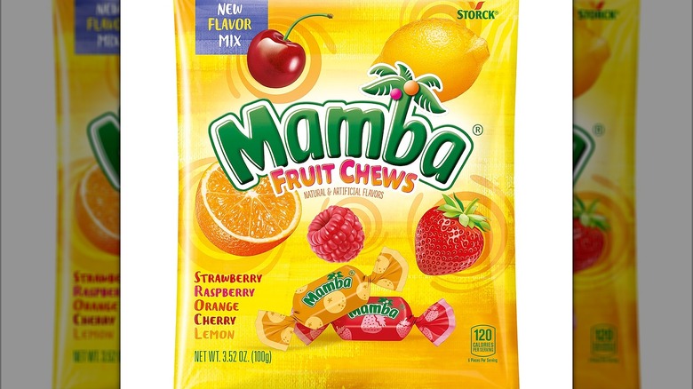 A yellow packet of Mamba fruit chews with flavors listed on the side