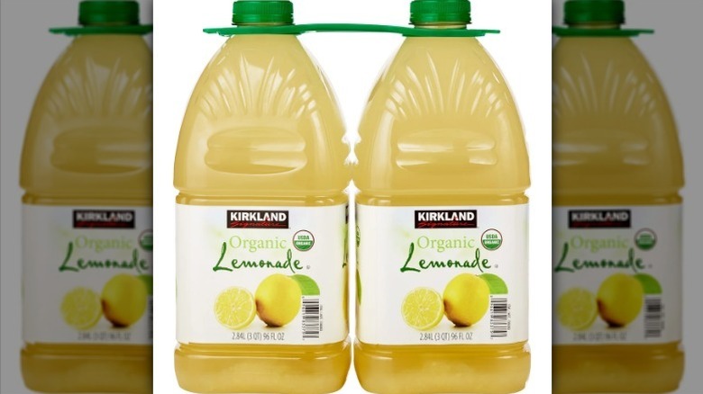 Two bottles of Kirkland lemonade on white background