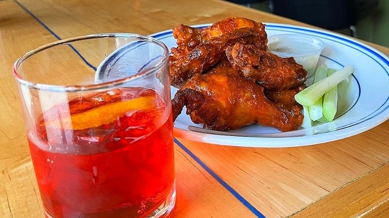 American Sardine Bar wings and cocktail