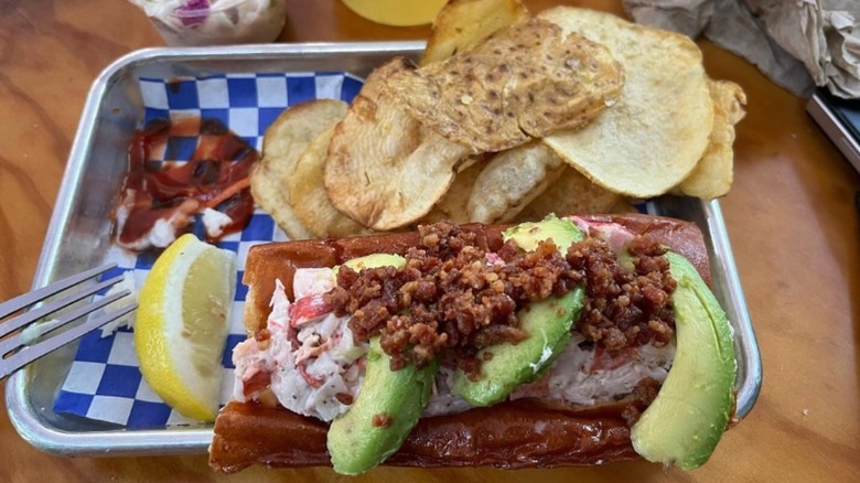 Seasonal lobster roll in serving boat